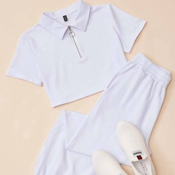 Conjunto camiseta con cremallera y pantalón color blanco