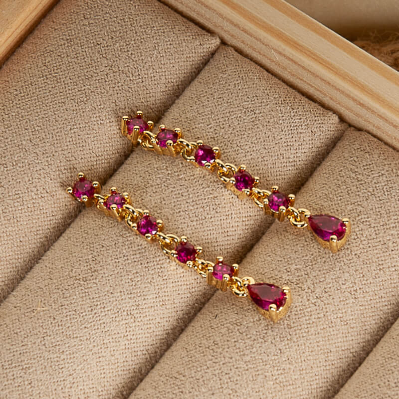 Aretes fucsia largos