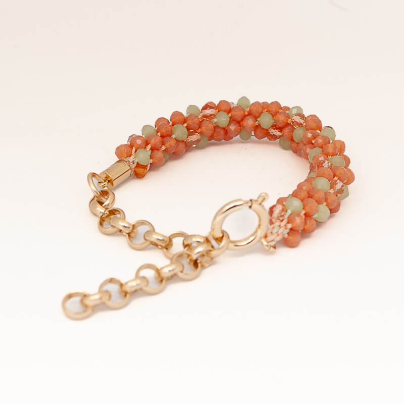 Pulsera tejida con cristales naranja - verde