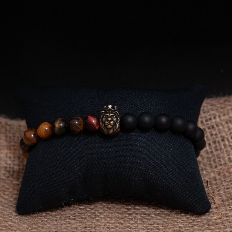 Pulsera Ojo de Tigre Con Negro y dije de León dorado