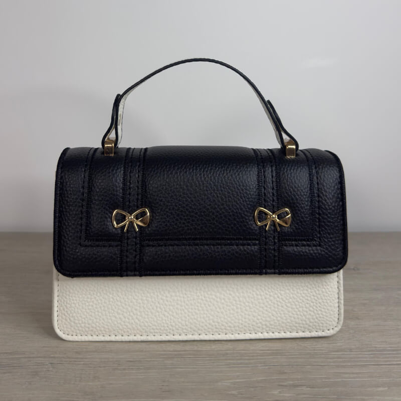 Cartera Elegante Blanca y Negra con Lazos: Bolso Chic para Mujer